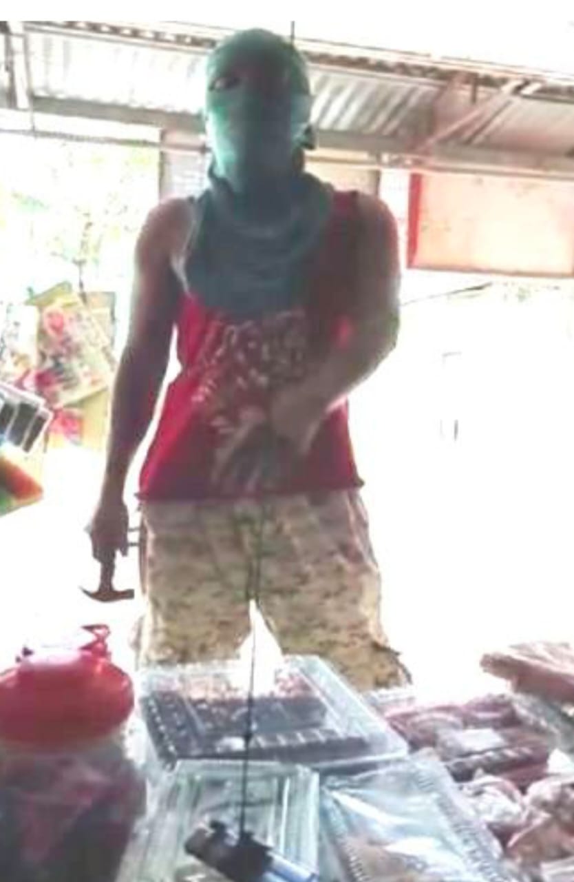 Pemalak Ancam Pedagang Grosir Dengn Palu